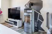 Wohnzimmer; Detailblick Ofen - 