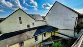 Rückansicht - Wohnhaus und Scheune - 