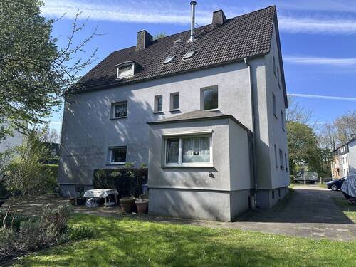 Gebäuderückseite - Solides Mehrfamilienhaus mit großem Grundstück im Grünzug von Gelsenkirchen-Buer