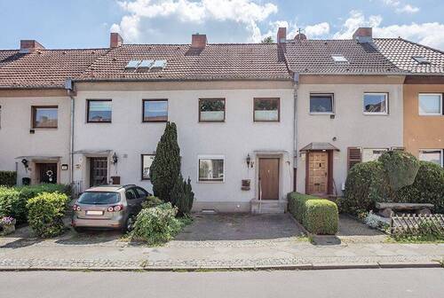 Vorderansicht - Helles Reihenmittelhaus an der Hufeisensiedlung in Britz