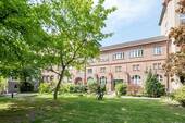 Hausansicht Gartenseite (im Sommer) - 4 Zimmer Etagenwohnung zum Kaufen in Berlin