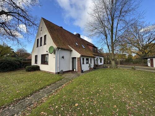 Außen 1 - Seltene Gelegenheit im Ortskern von Fischerhude - Doppelhaus auf großem Grundstück