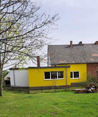 Blick vom Dorfpark 1 - 1 Zimmer Mehrfamilienhaus, Wohnhaus zum Kaufen in Heideblick