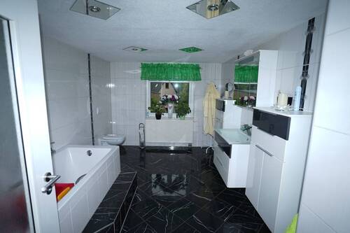 Bad OG vermietetes Haus - 