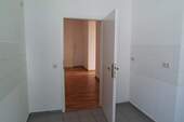 Küche - Ansicht zum Flur.jpg - 