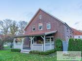 Veranda - 5 Zimmer Mehrfamilienhaus, Wohnhaus zum Kaufen in Großefehn