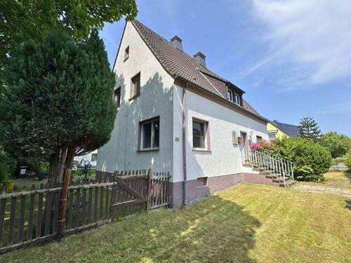 Seitenansicht - 5 Zimmer Mehrfamilienhaus, Wohnhaus zum Kaufen in Dortmund