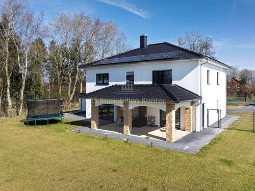 Bild 2 - 7 Zimmer Einfamilienhaus zum Kaufen in Surwold