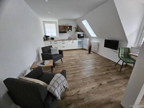Wohnzimmer - 2 Zimmer Etagenwohnung zum Kaufen in Bad Zwischenahn