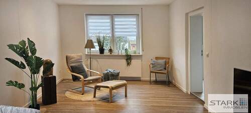 Wohnzimmer.jpg - 6 Zimmer Einfamilienhaus zum Kaufen in Kleinrinderfeld