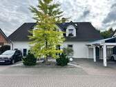 Straßenansicht.JPG - Schöne Erdgeschosswohnung mit Garten in Holzhausen