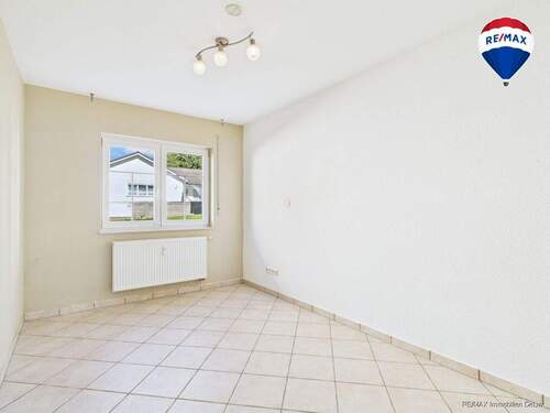 Erdgeschoss Wohnung in Besch mit Terrasse & Carport zu verkaufen - 