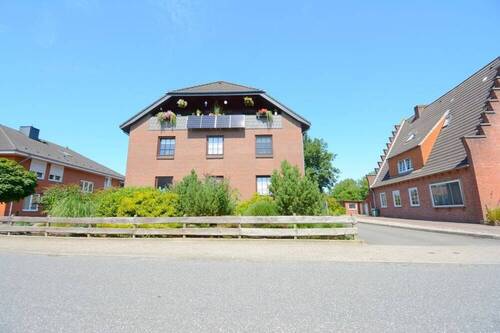 Außenansicht - -provisionsfrei- Über den Dächern von Heide; DG-Eigentumswohnung in guter Wohnlage