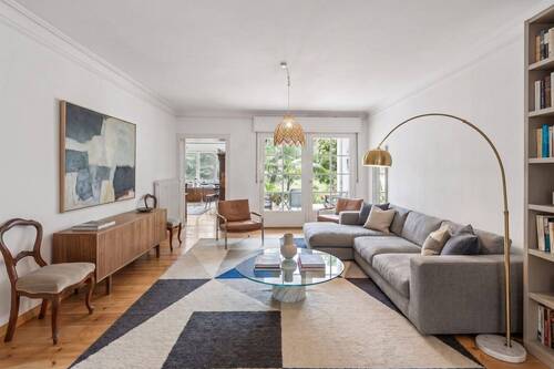 Einrichtungsbeispiel Wohnbereich im Erdgeschoss mit Gartenzugang - 1 Zimmer Doppelhaushälfte zum Kaufen in Berlin