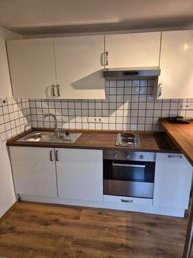 Küche - Für sportliche Singles in Top-Lage: Schönes Apartment im Dachgeschoss mit Einbauküche