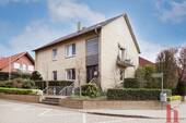 Außen I - Solides Mehrfamilienhaus in zentrumsnaher Lage mit Potential in Lohne