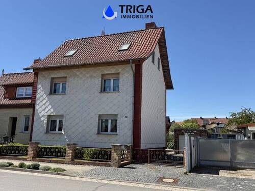 Ansicht von der Straße - Familienfreundliche Doppelhaushälfte mit sonnigen Garten, Garage und viel Platz in Sundhausen!