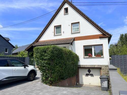 Ansicht Front mit Garage - Einfamilienhaus mit 160,00 m² in Freilingen zum Kaufen