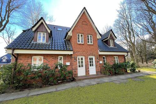 Eingangsseite - Attraktive Ferienwohnung (baurechtl. genehmigt) direkt am Südstrand (hervorragende Vermietbarkeit)