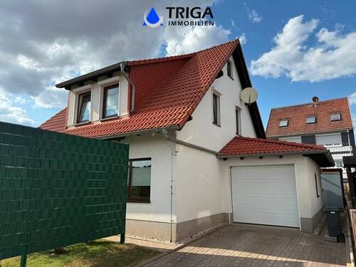 Garage mit Zugang zum Haus - Einfamilienhaus mit 110,00 m² in Werther / Groß-Werther zum Kaufen