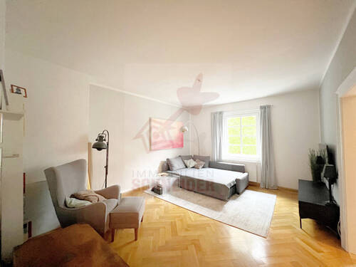 Wohnzimmer I - 3 Zimmer Etagenwohnung zum Kaufen in München