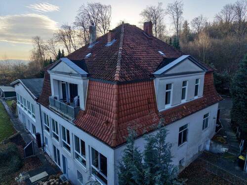 Seitenansicht - 7 Zimmer Mehrfamilienhaus, Wohnhaus zum Kaufen in Barsinghausen