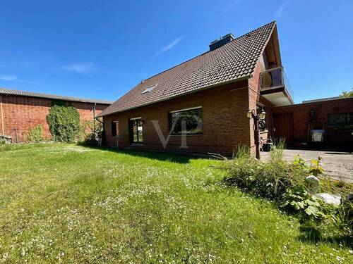 Garten - 7 Zimmer Mehrfamilienhaus, Wohnhaus zum Kaufen in Gehrden / Lemmie