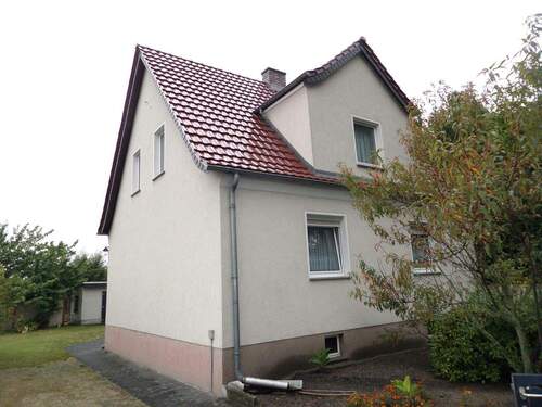 Haus Seitenansicht - 6 Zimmer Einfamilienhaus zum Kaufen in Döllingen