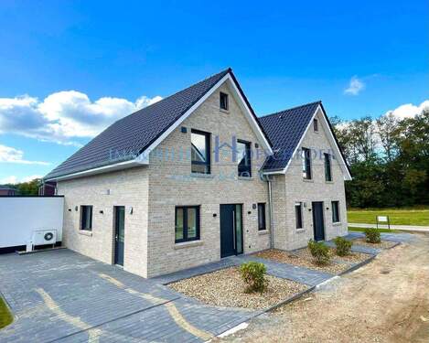 Ansicht - M 5622 - Wohnen am Wasser! Bezugsfertige und energieeffiziente Doppelhaushälfte!