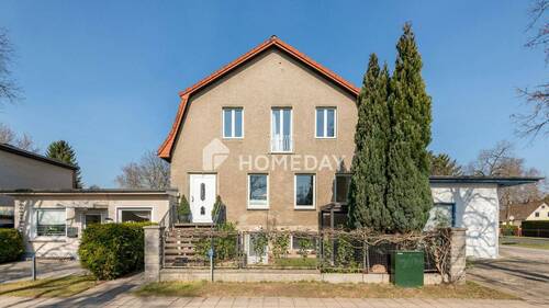 Außenansicht 1 - Gepflegtes Mehrfamilienhaus mit 2 Wohneinheiten, Friseur, Werkstatt und Lager