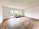 Wohnzimmer - Lichtdurchflutete 3-Zimmer-Wohnung mit Terrasse in attraktiver Lage!