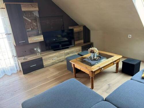 Wohnzimmer_DG - Einfamilienhaus mit 195,00 m&sup2; in Irmenach zum Kaufen