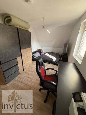 Schlafzimmer 1 MaisonettewohnunMaisonettewohnun - 