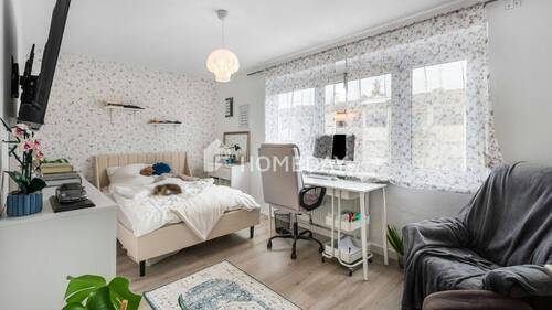 1. OG Schlafzimmer 1 - 