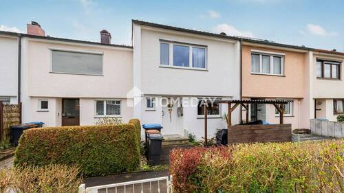 Außenansicht 1 - Charmantes Reihenhaus mit sonniger Terrasse und liebevoll angelegtem Garten