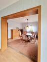 Esszimmer mit Durchgang zum Wohnzimmer - 