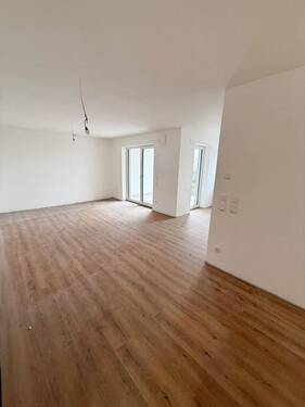 Wohn-Esszimmer - Erstvermietung 3-Zimmer-Neubauwohnung Parkstetten