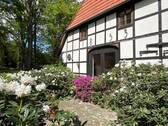 Vorgarten - Mehrfamilienhaus, Wohnhaus mit 383,10 m² in Bassum / Katenkamp zum Kaufen