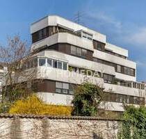 Im Zentrum von Deggendorf: Großzügige Wohnung mit Wintergarten, Balkonen und Tiefgaragenstellplatz