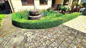 Garten mit Brunnen - 