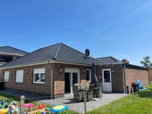 Seitenansicht - Einfamilienhaus mit 72,70 m² in Saterland zum Kaufen