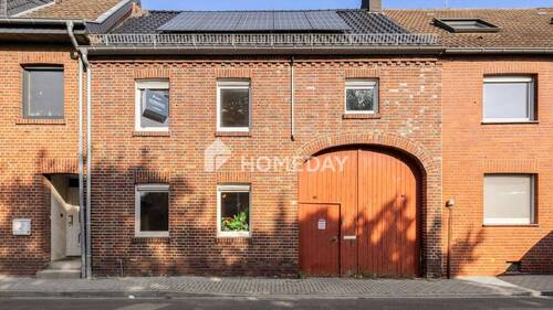Außenansicht 1 - Liebhaberobjekt: charmantes Reihenmittelhaus mit Ausbaupotenzial und Garten in ruhiger Lage