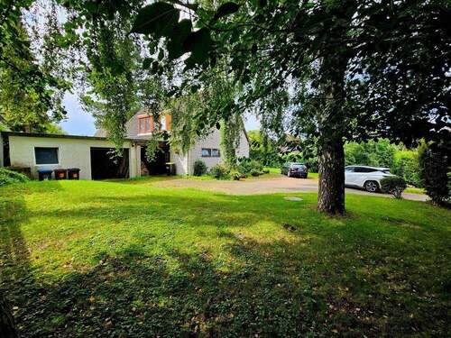 Bild 1 - Einfamilienhaus mit Büro und großer Garage in Molfsee