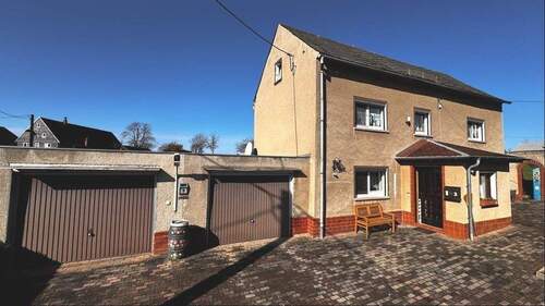 Ansicht mit Doppelgarage - Einfamilienhaus mit 110,00 m&sup2; in Rossau zum Kaufen