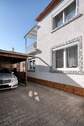 Einfahrt mit Carport - 4 Zimmer Mehrfamilienhaus, Wohnhaus zum Kaufen in Fußgönheim