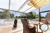Überdachte, teils windgeschütze Dachterrasse - 