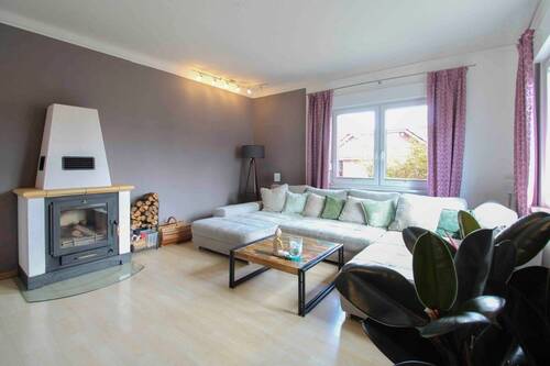 Wohnzimmer mit Kamin - Einfamilienhaus mit 103,30 m² in Blankenfelde-Mahlow zum Kaufen