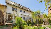 Außenansicht 3 - Einfamilienhaus mit 2 Wohneinheiten und weiterem Ausbaupotenzial mit Naturgarten und Nebengelass