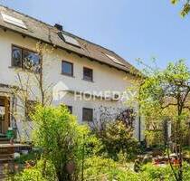 Einfamilienhaus mit 2 Wohneinheiten und weiterem Ausbaupotenzial mit Naturgarten und Nebengelass - Kammerstein Barthelmesaurach