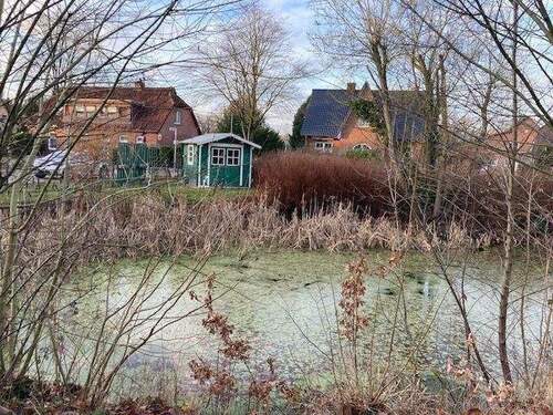 Grundstück mit großem Teich - 